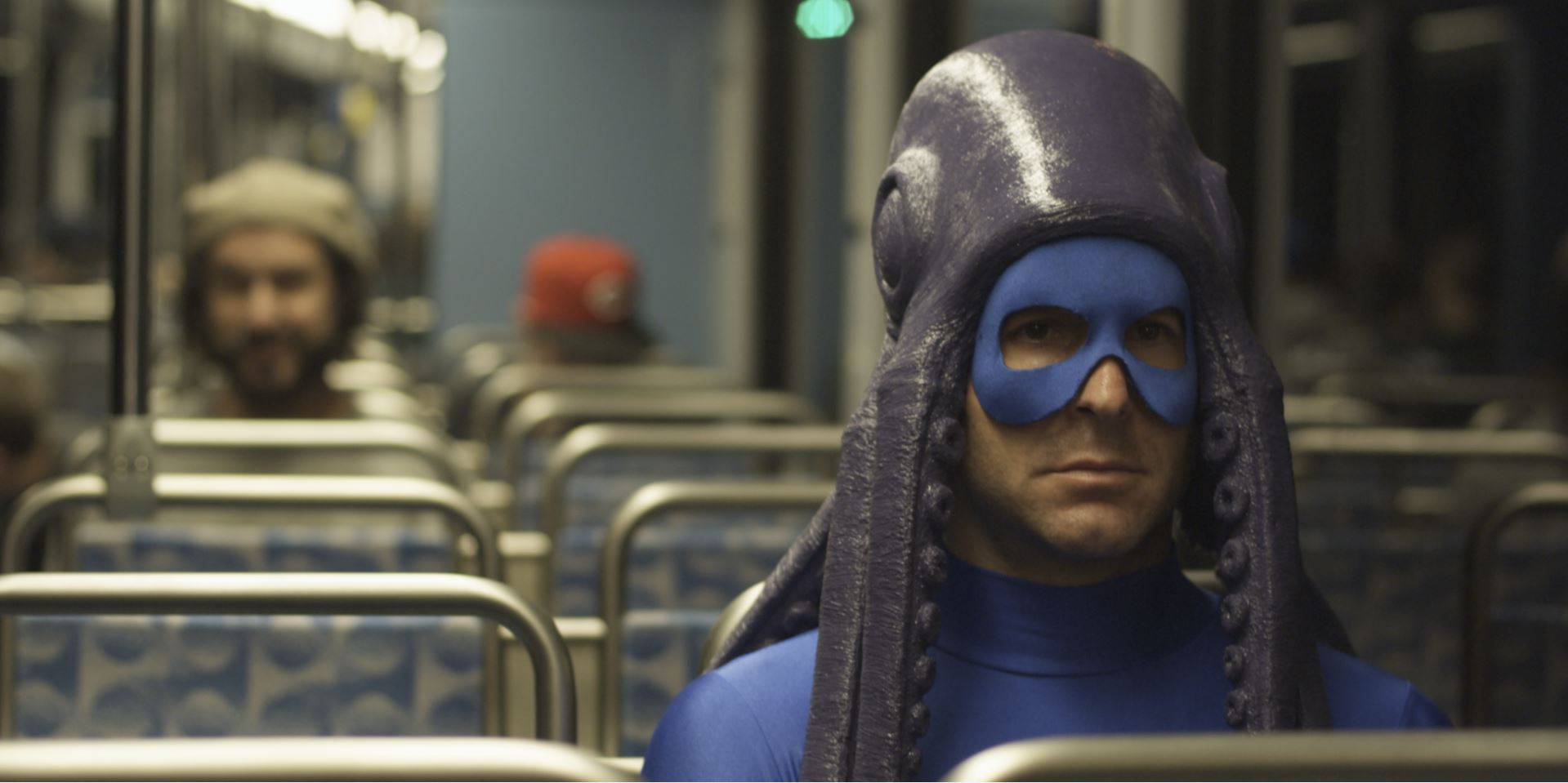 Squid Man on the Train